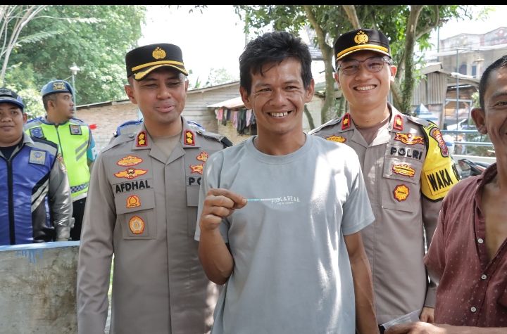 Kapolres dan Waka Polres Asahan Kunjungi Personil Bertugas Menjaga Arus Mudik OPS Ketupat Toba 2024