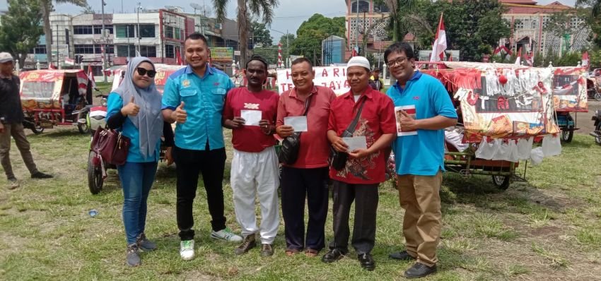 Semarak HUT ke 79 Tahun RI, Hatari Biskuit Ajak Abang Betor Beserta Keluarganya Konvoi di Medan