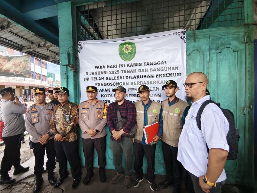 Polres Padangsidimpuan Lakukan Pengamanan Eksekusi Pengosongan Risalah Lelang di Jalan Sitombol