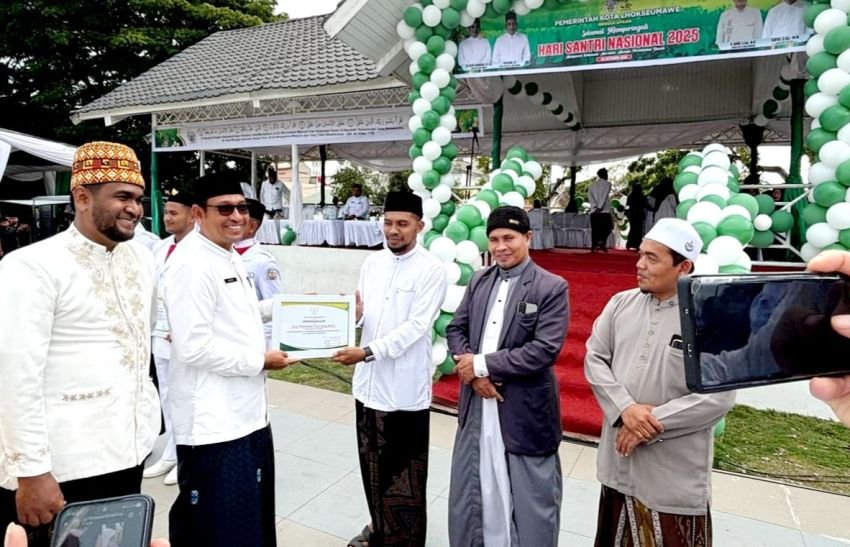 Pemko Lhokseumawe Peringati hari santri Nasional dilapangan hiraq..