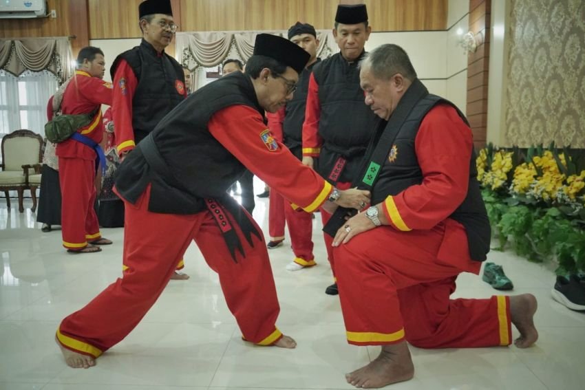 Momentum Milad Muhammadiyah Ke 113, Tapak Suci Kukuhkan Bupati Asahan sebagai Pendekar Madya