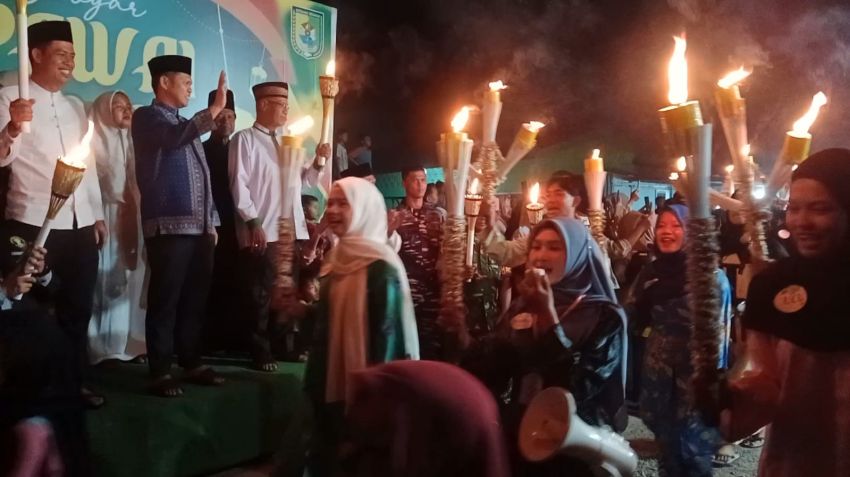 Melestarikan Tradisi Leluhur, Ribuan Warga Tanjung Beringin Semarakkan Gebyar Pawai Obor Sambut Ramadan 1447 H